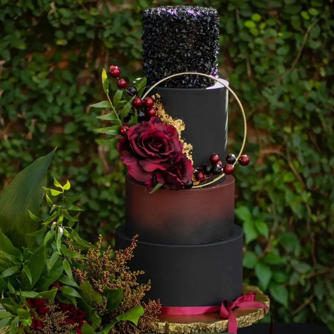 Black and red tiered cake